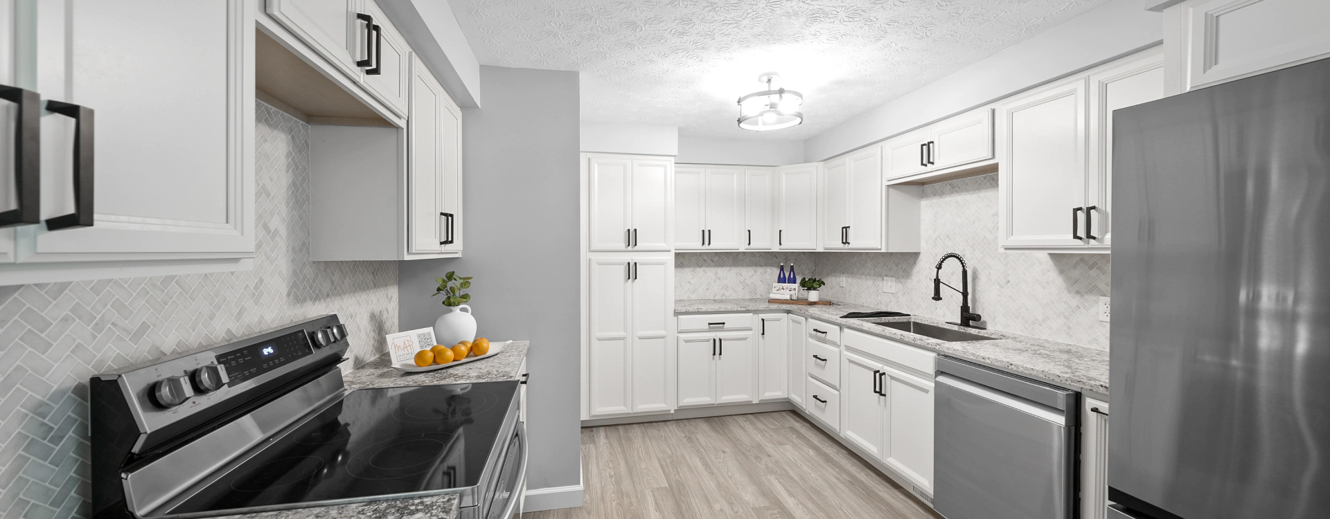 kitchen with white cabinets